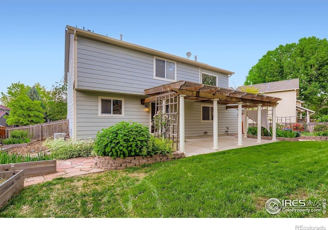 1616 Cedarwood Dr, Longmont, CO 80504 - rear view of house with a patio area, a pergola, and a vegetable garden