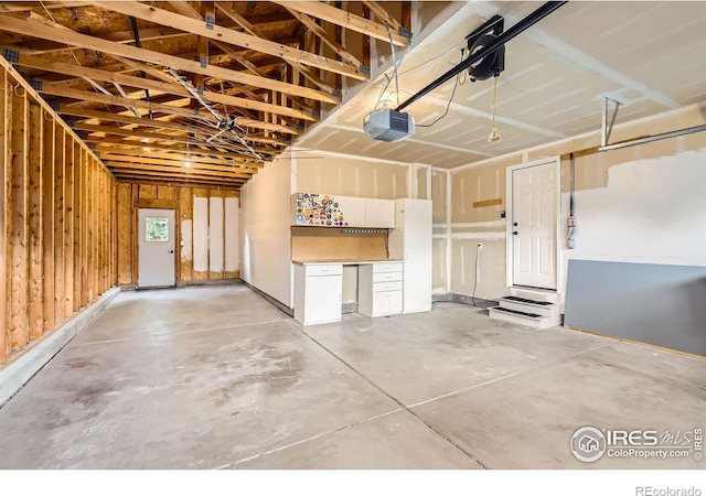 1616 Cedarwood Dr, Longmont, CO 80504 - garage with a garage door opener