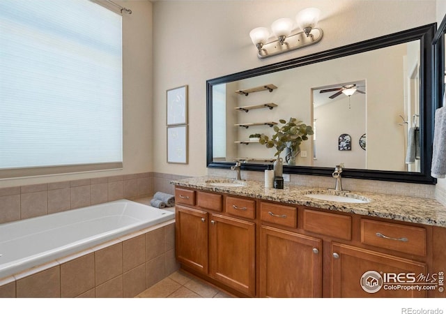 2833 Annelise Way, Fort Collins, CO 80525 - bathroom featuring double vanity, a bath, tile patterned flooring, and ceiling fan