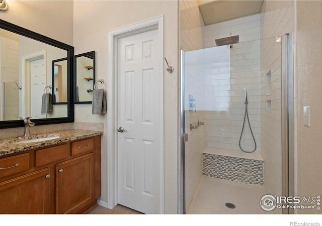 2833 Annelise Way, Fort Collins, CO 80525 - full bath with a shower stall, vanity, and tile patterned flooring