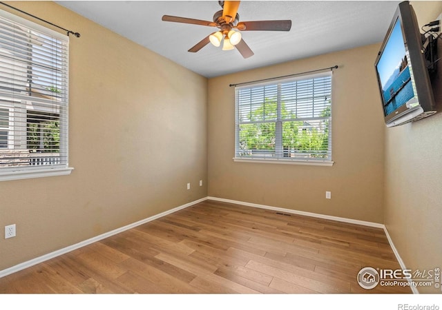 2833 Annelise Way, Fort Collins, CO 80525 - unfurnished room featuring light wood-type flooring and a ceiling fan
