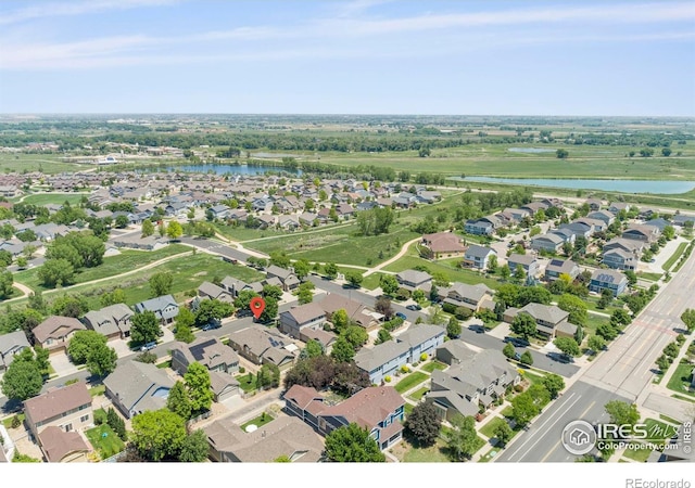 2833 Annelise Way, Fort Collins, CO 80525 - aerial overview of property's location with a large body of water and nearby suburban area