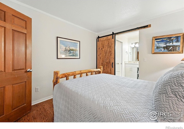 854 Walnut St Unit B, Boulder, CO 80302 - bedroom with a barn door, wood finished floors, ornamental molding, and ensuite bathroom