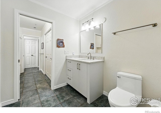 854 Walnut St Unit B, Boulder, CO 80302 - bathroom with vanity, ornamental molding, and stone finish floors
