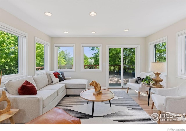 2016 Strathmore St, Louisville, CO 80027 - living room featuring plenty of natural light, recessed lighting, and light wood finished floors