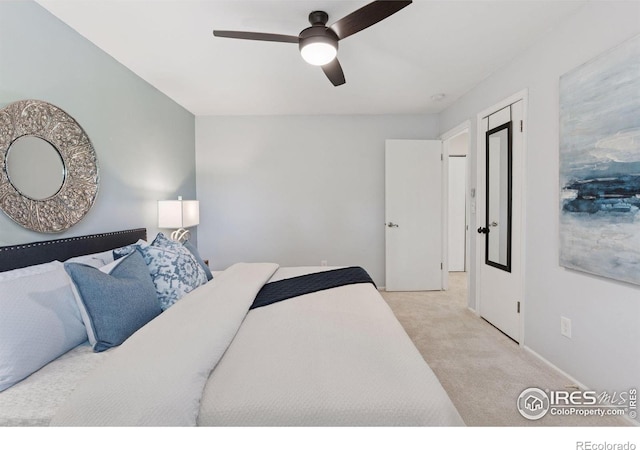 2016 Strathmore St, Louisville, CO 80027 - bedroom with light carpet and a ceiling fan