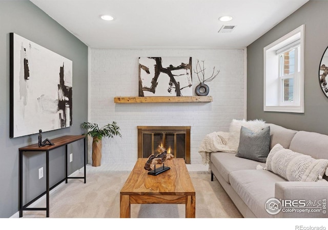 2016 Strathmore St, Louisville, CO 80027 - living area with carpet, recessed lighting, and a fireplace