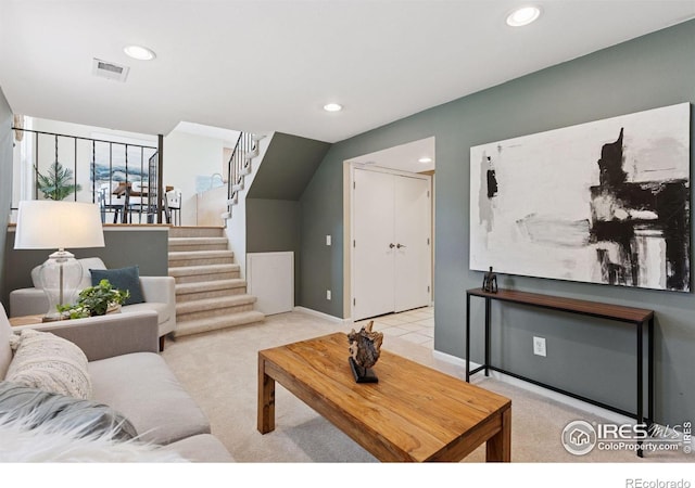 2016 Strathmore St, Louisville, CO 80027 - living area featuring light carpet, stairway, and recessed lighting