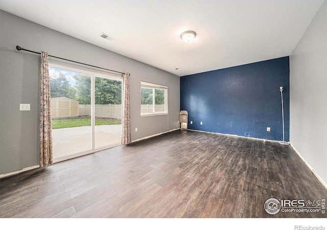 9673 Roadrunner Ave, Firestone, CO 80504 - unfurnished room featuring wood finished floors and baseboards