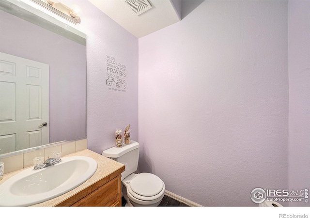 9673 Roadrunner Ave, Firestone, CO 80504 - bathroom with toilet and vanity