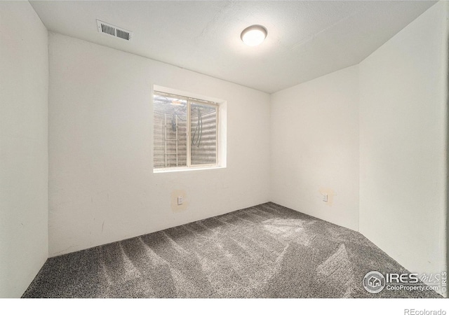9673 Roadrunner Ave, Firestone, CO 80504 - spare room with carpet