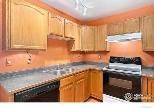 3350 Saratoga St Unit C, Wellington, CO 80549 - kitchen featuring under cabinet range hood, electric range oven, dishwasher, and track lighting