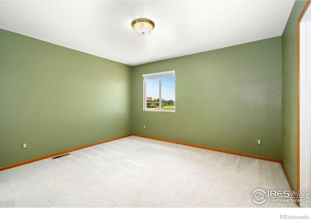 3350 Saratoga St Unit C, Wellington, CO 80549 - carpeted spare room featuring baseboards