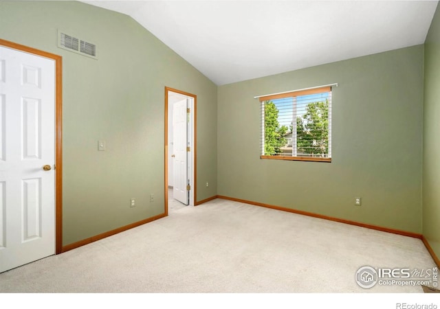 3350 Saratoga St Unit C, Wellington, CO 80549 - unfurnished bedroom with carpet floors and lofted ceiling