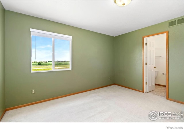 3350 Saratoga St Unit C, Wellington, CO 80549 - unfurnished room featuring light carpet and baseboards