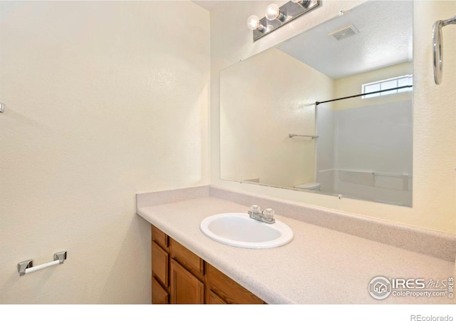 3350 Saratoga St Unit C, Wellington, CO 80549 - bathroom featuring vanity and a shower