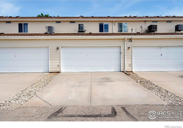 3350 Saratoga St Unit C, Wellington, CO 80549 - view of property with driveway and a garage