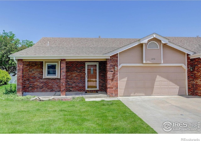 1250 Honeysuckle Ct, Windsor, CO 80550 - single story home with driveway, a garage, a front lawn, brick siding, and a shingled roof
