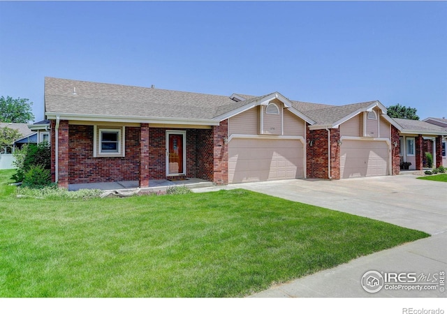 1250 Honeysuckle Ct, Windsor, CO 80550 - ranch-style home with an attached garage, a front yard, brick siding, driveway, and a shingled roof