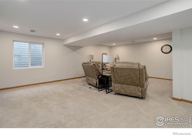 1250 Honeysuckle Ct, Windsor, CO 80550 - carpeted living area with recessed lighting
