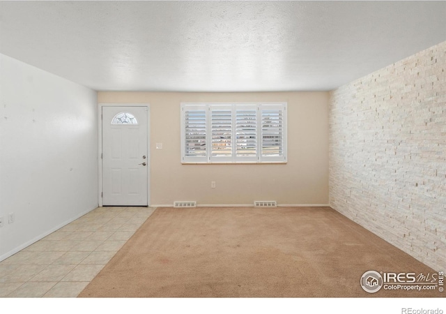 7162 Quay St, Arvada, CO 80003 - foyer with tile patterned flooring