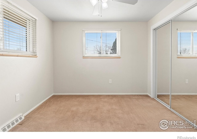 7162 Quay St, Arvada, CO 80003 - unfurnished bedroom featuring carpet, a closet, and ceiling fan