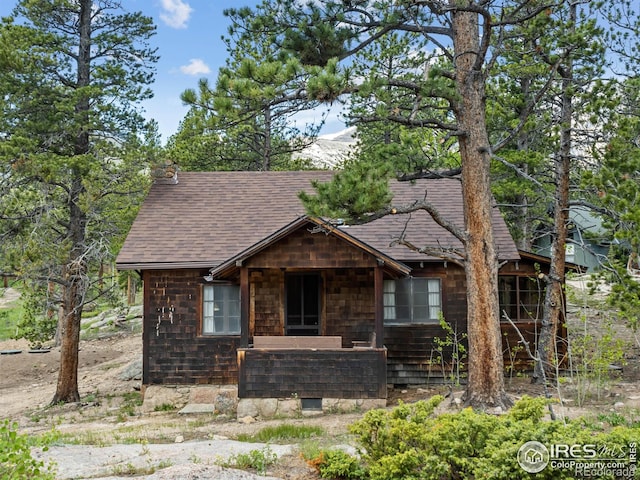 84 County Road 113 N, Allenspark, CO 80510 - view of front of house with roof with shingles