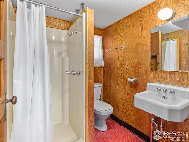 84 County Road 113 N, Allenspark, CO 80510 - full bathroom with a shower with shower curtain and wooden walls