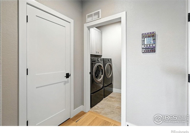 1101 Hillside Ln, Louisville, CO 80027 - laundry room with washing machine and clothes dryer and cabinet space