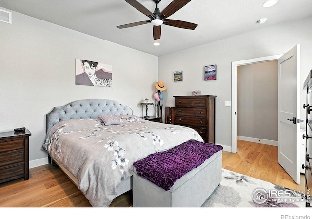 1101 Hillside Ln, Louisville, CO 80027 - bedroom featuring wood finished floors, recessed lighting, and a ceiling fan