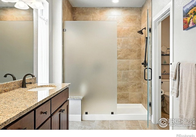 1101 Hillside Ln, Louisville, CO 80027 - full bath with a shower stall, vanity, and recessed lighting