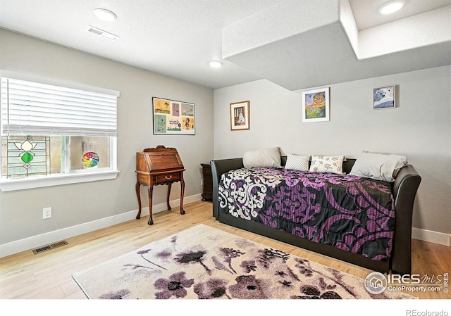 1101 Hillside Ln, Louisville, CO 80027 - bedroom with baseboards and wood finished floors