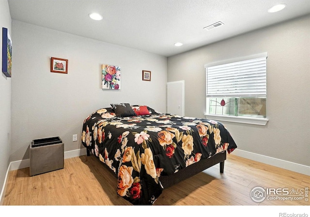 1101 Hillside Ln, Louisville, CO 80027 - bedroom featuring wood finished floors and recessed lighting