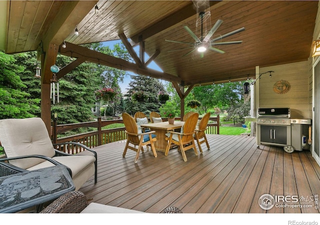 2006 Mackenzie Ct, Fort Collins, CO 80528 - deck with outdoor dining space, a ceiling fan, and grilling area