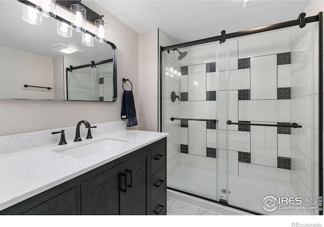 2006 Mackenzie Ct, Fort Collins, CO 80528 - full bathroom with a stall shower, vanity, and marble finish floors