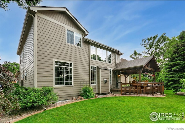 2006 Mackenzie Ct, Fort Collins, CO 80528 - rear view of house with a yard, a deck, and a gazebo