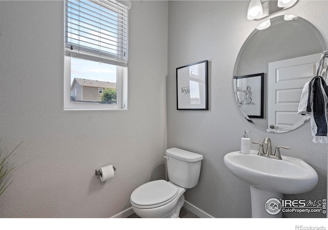 2332 Tabor St, Berthoud, CO 80513 - half bath with toilet and baseboards