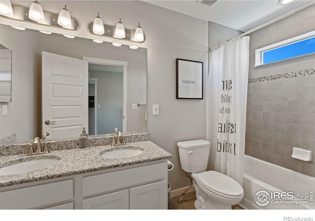 2332 Tabor St, Berthoud, CO 80513 - bathroom featuring double vanity and shower / bath combination with curtain