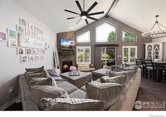 4041 Carroway Seed Dr, Johnstown, CO 80534 - living area featuring ceiling fan, a chandelier, a stone fireplace, beam ceiling, and high vaulted ceiling