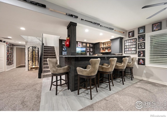 4041 Carroway Seed Dr, Johnstown, CO 80534 - indoor bar with recessed lighting, stairway, ceiling fan, and light carpet