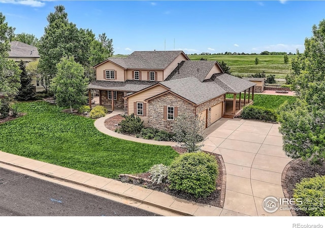 6544 Saddleback Ave, Longmont, CO 80504 - view of front of property featuring driveway, an attached garage, stone siding, a front lawn, and a shingled roof