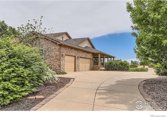 6544 Saddleback Ave, Longmont, CO 80504 - view of side of property with a garage, concrete driveway, and roof with shingles