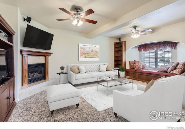 6544 Saddleback Ave, Longmont, CO 80504 - living area with ceiling fan and a glass covered fireplace