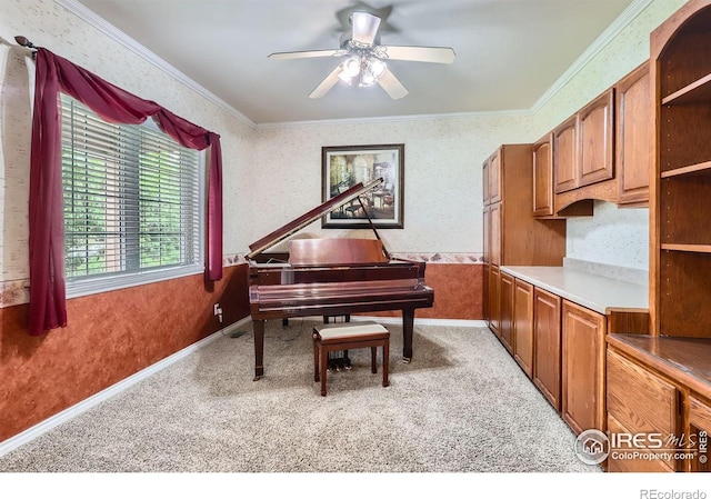 6544 Saddleback Ave, Longmont, CO 80504 - sitting room featuring crown molding, light colored carpet, wallpapered walls, and ceiling fan