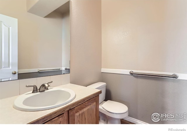 6544 Saddleback Ave, Longmont, CO 80504 - bathroom with toilet and vanity