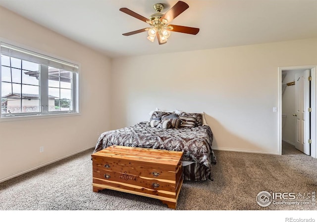 6544 Saddleback Ave, Longmont, CO 80504 - carpeted bedroom featuring baseboards and ceiling fan