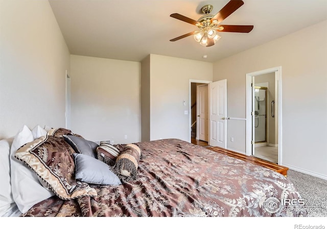 6544 Saddleback Ave, Longmont, CO 80504 - bedroom featuring connected bathroom and a ceiling fan