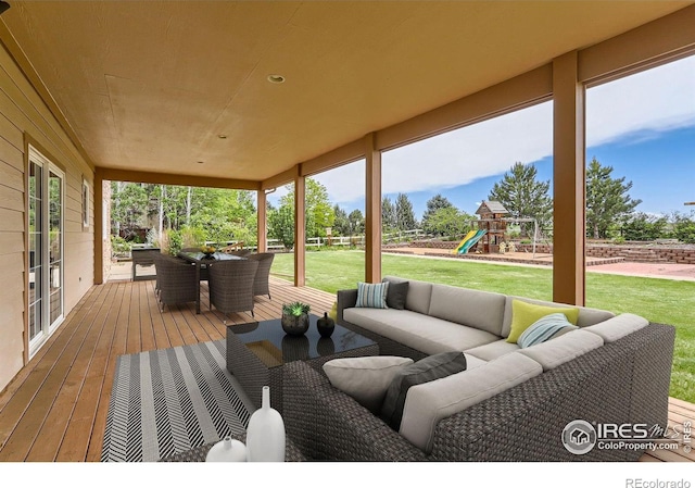 6544 Saddleback Ave, Longmont, CO 80504 - wooden terrace with an outdoor hangout area, a playground, and outdoor dining space