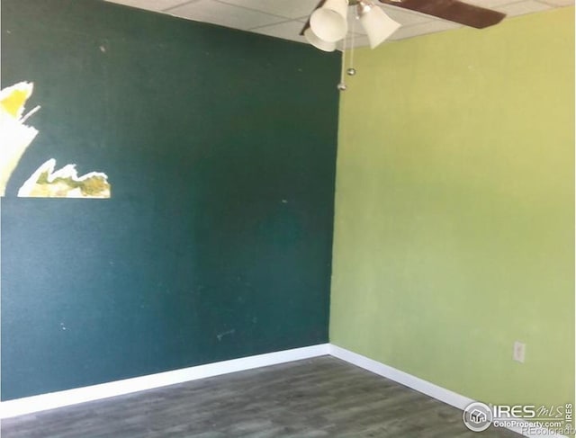 23243 Pawnee Ave, Padroni, CO 80745 - unfurnished room featuring ceiling fan and dark wood finished floors