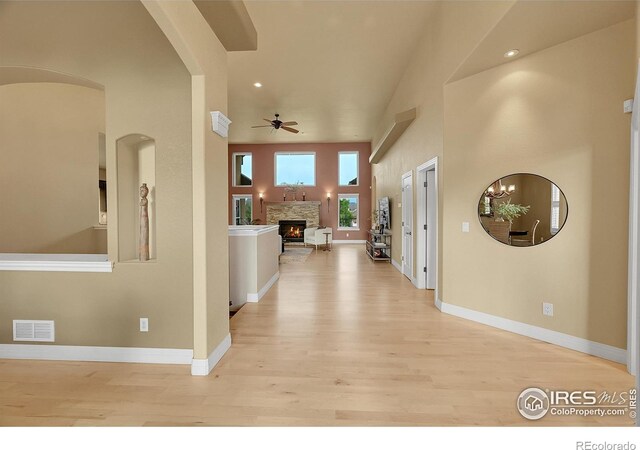 8406 Spinnaker Bay Dr, Windsor, CO 80528 - corridor with light wood finished floors and recessed lighting
